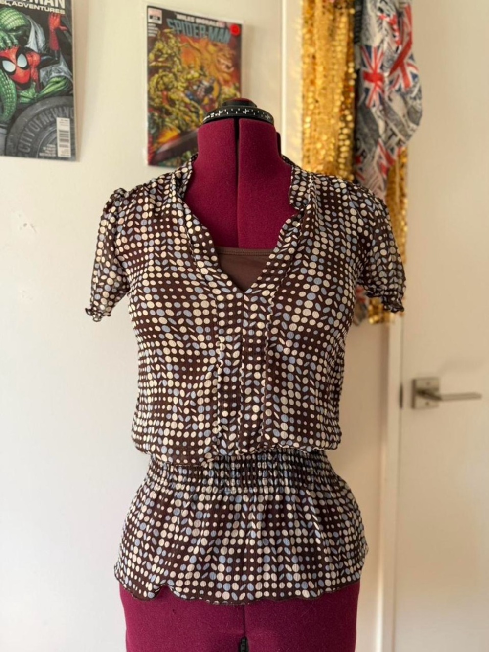 Studio 1940 brown polka dot blouse with ruffle collar and bottom